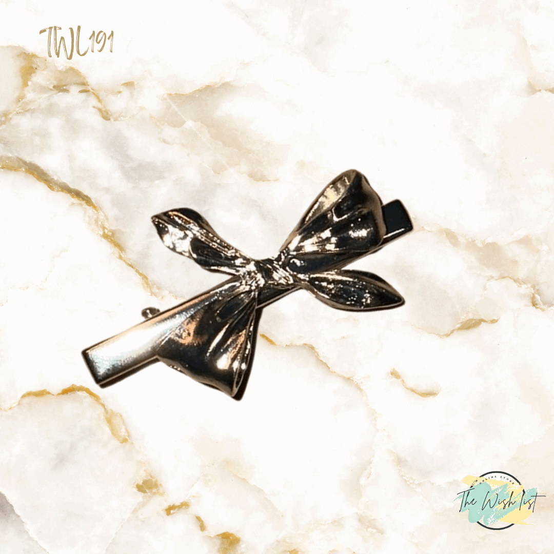 Elegant Silver Tone Bow hair clip with alligator clip