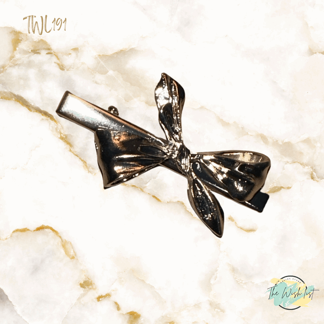 Elegant Silver Tone Bow hair clip with alligator clip