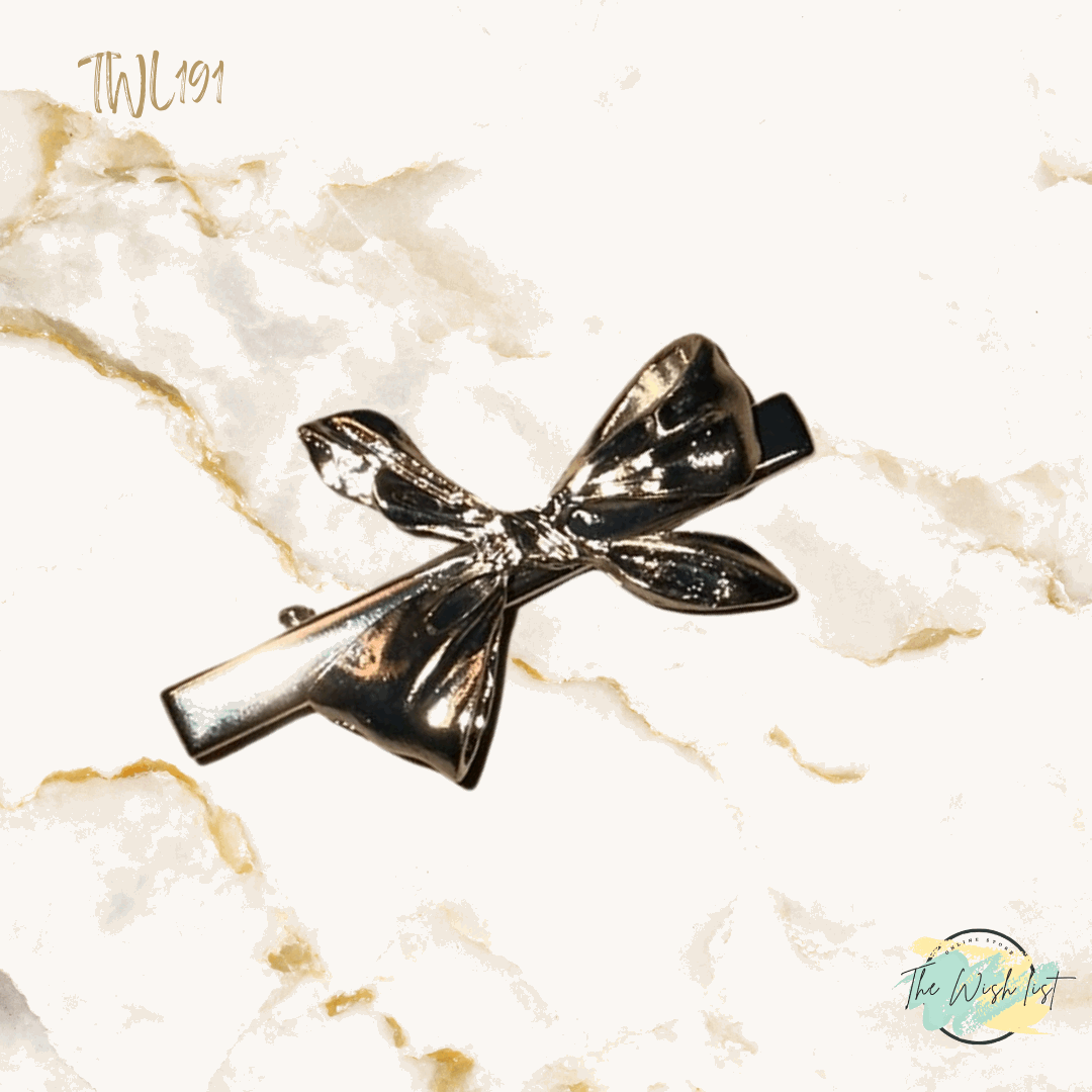 Elegant Silver Tone Bow hair clip with alligator clip